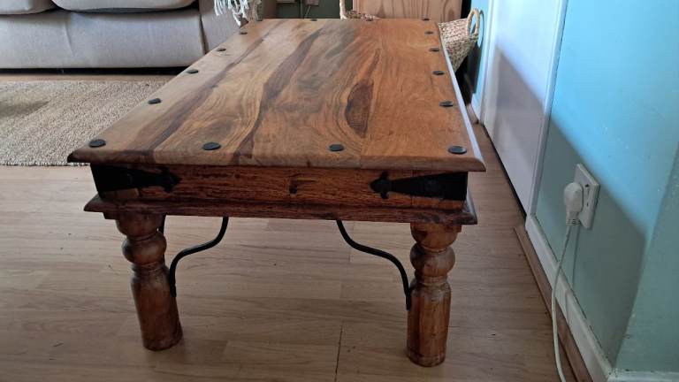 Solid Wood Coffee Table with Metal Accents – Good Condition