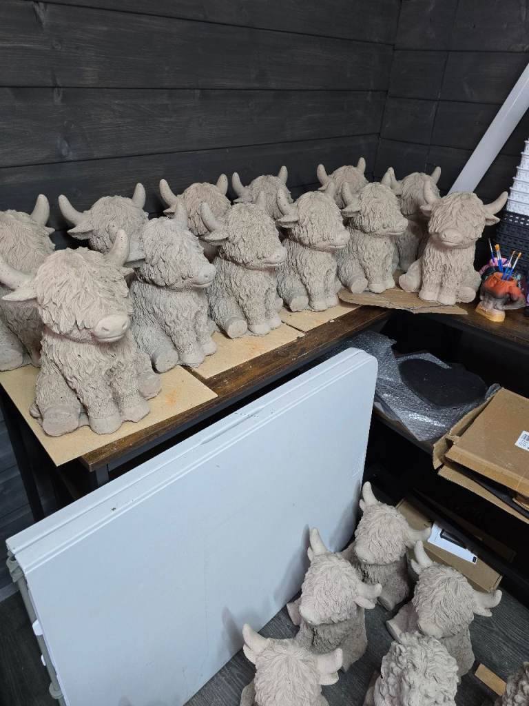 Concrete garden statues off highland cows 1 feet tall