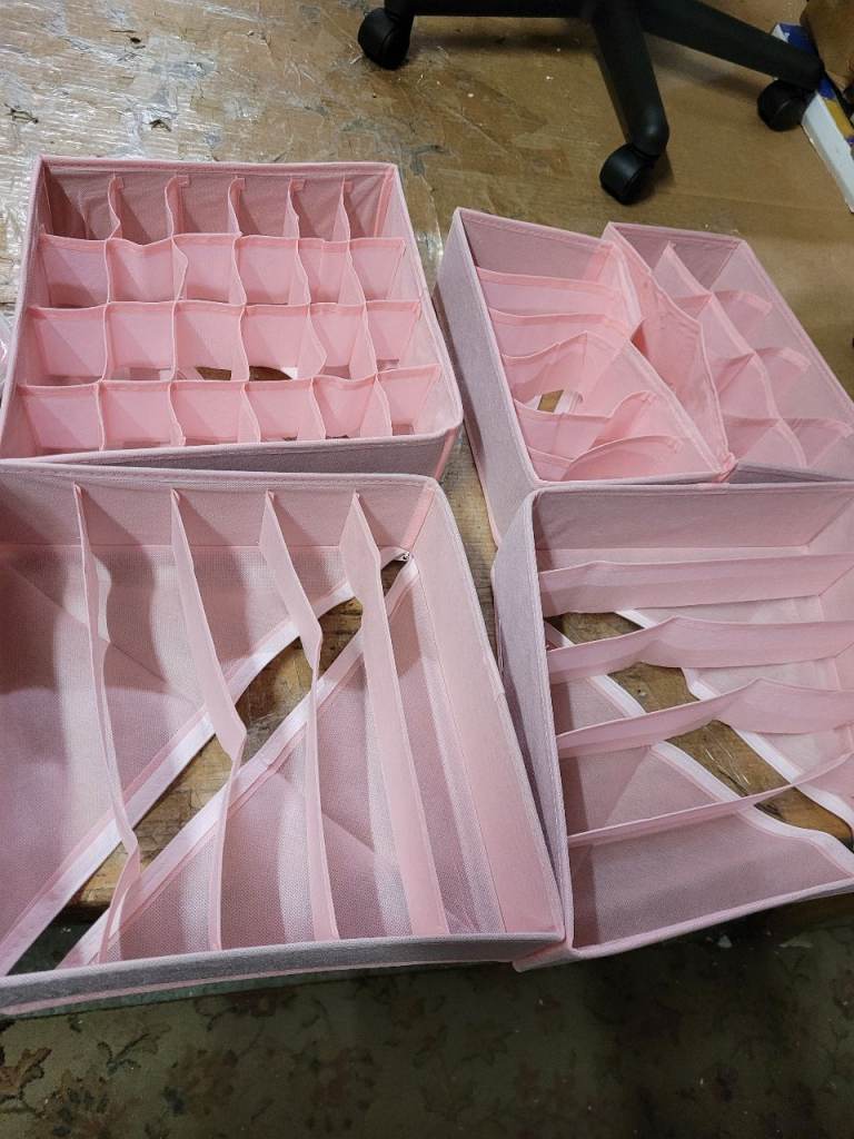 A new 8 pcs set of pink canvas drawer organizers they are folding 