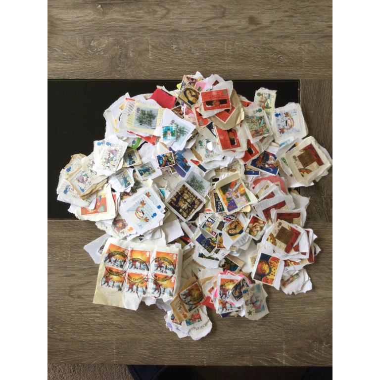 Over 100 plus various UK Christmas stamps on paper.