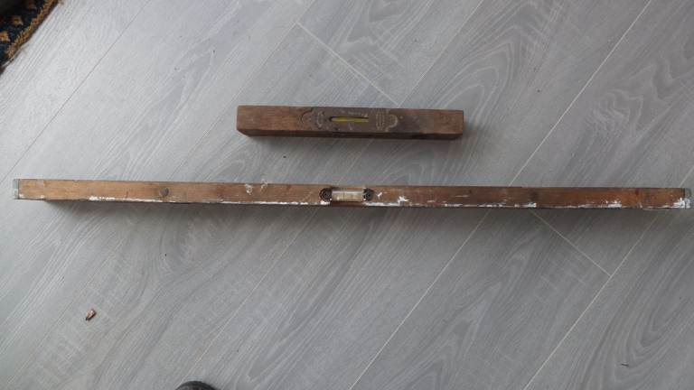 Two vintage wooden carpenters levels small one by J Rabone and Sons