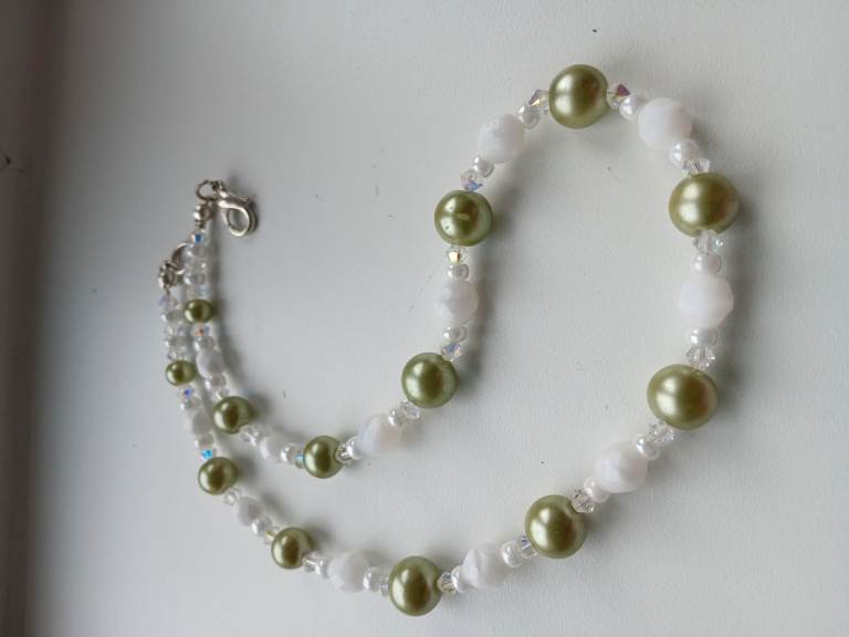 Set of green and white beads