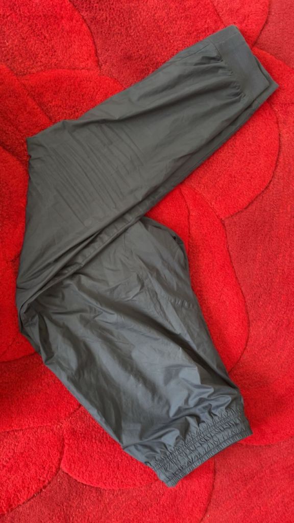 Nike blue track pants with black logo Size M