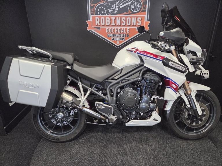 2013 Triumph Tiger Explorer 1215 in white with luggage.