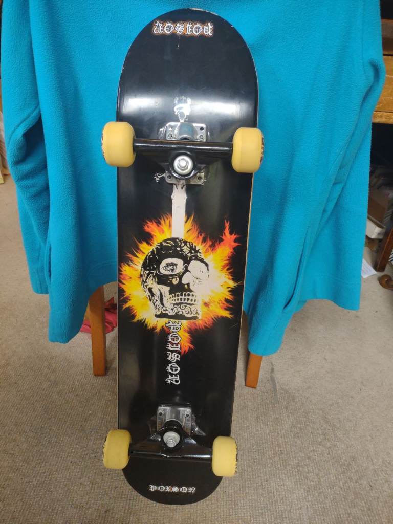 Poison Skateboard - as new condition 