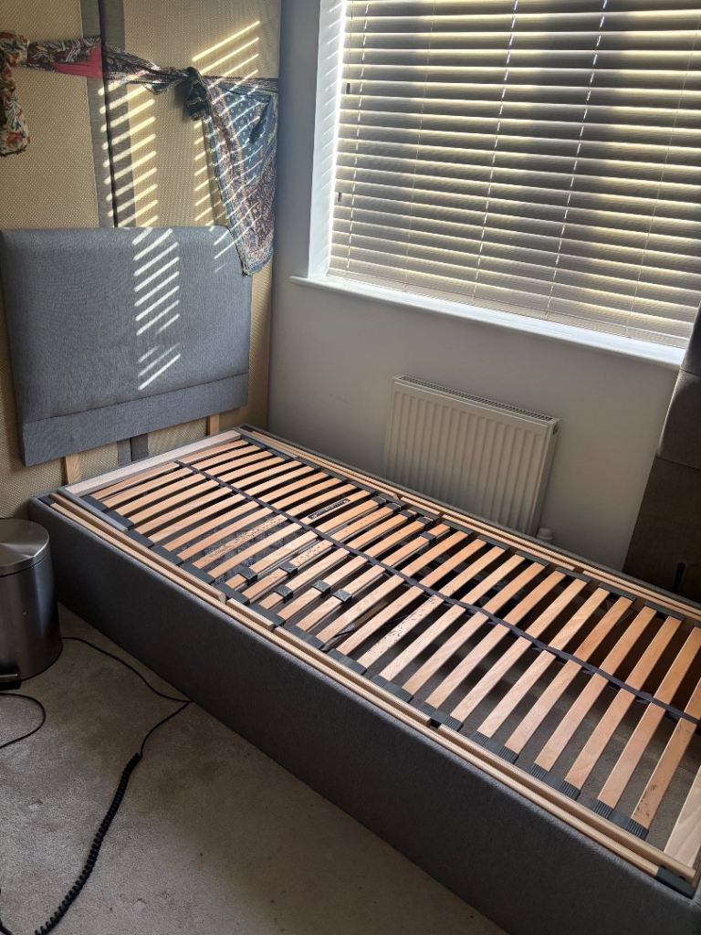 Adjustable single bed - no mattress - good condition 