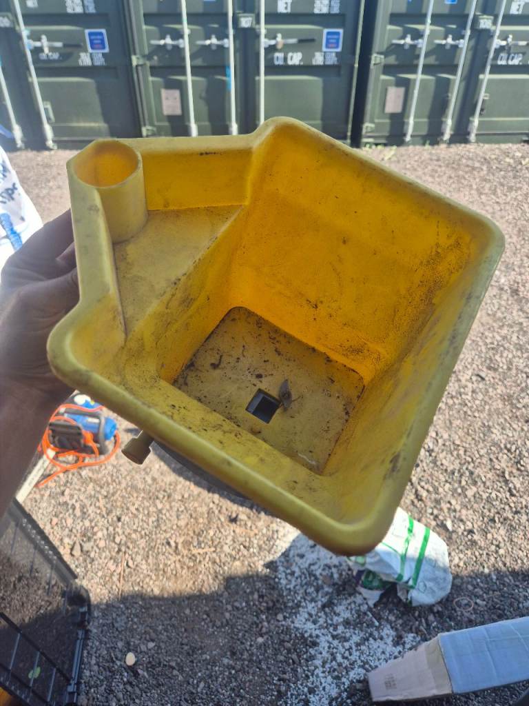Yellow Handheld Seed Spreader – Fair Condition