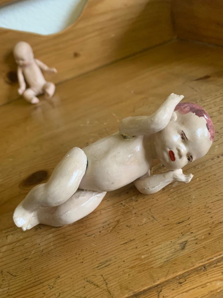 2 vintage dolls, 1 from 1985, 1 eatlier bisque doll