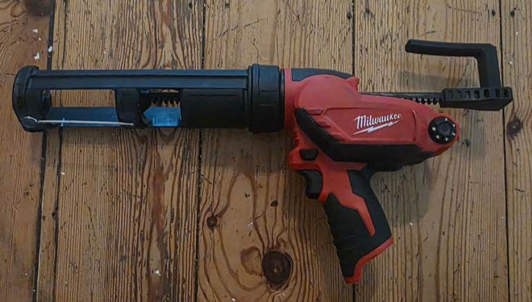 For sale is a Milwaukee M12 caulking gun