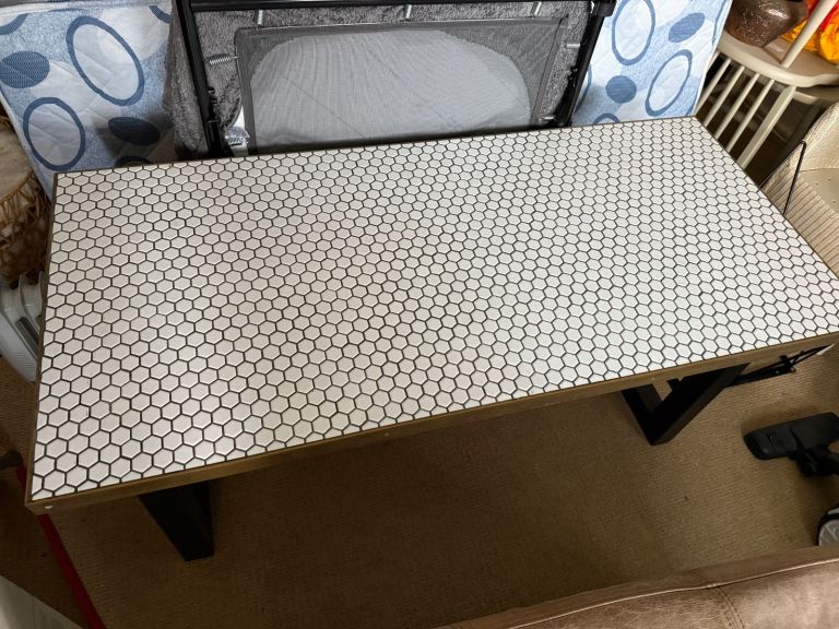 Funky long coffee table with tiled top 