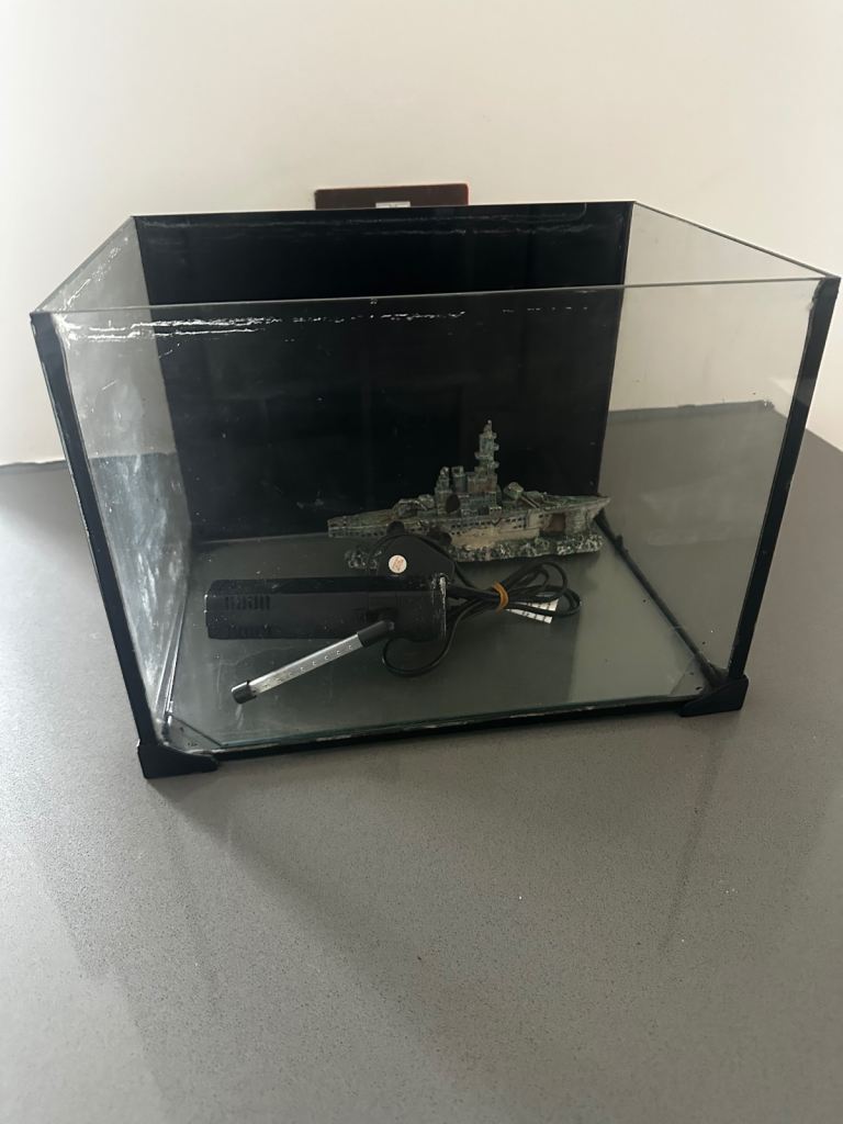 Small Glass Aquarium with Filter and ship ornament 