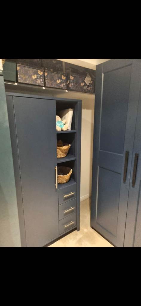 Blue Wardrobe with Shelves and Drawers – Good Condition