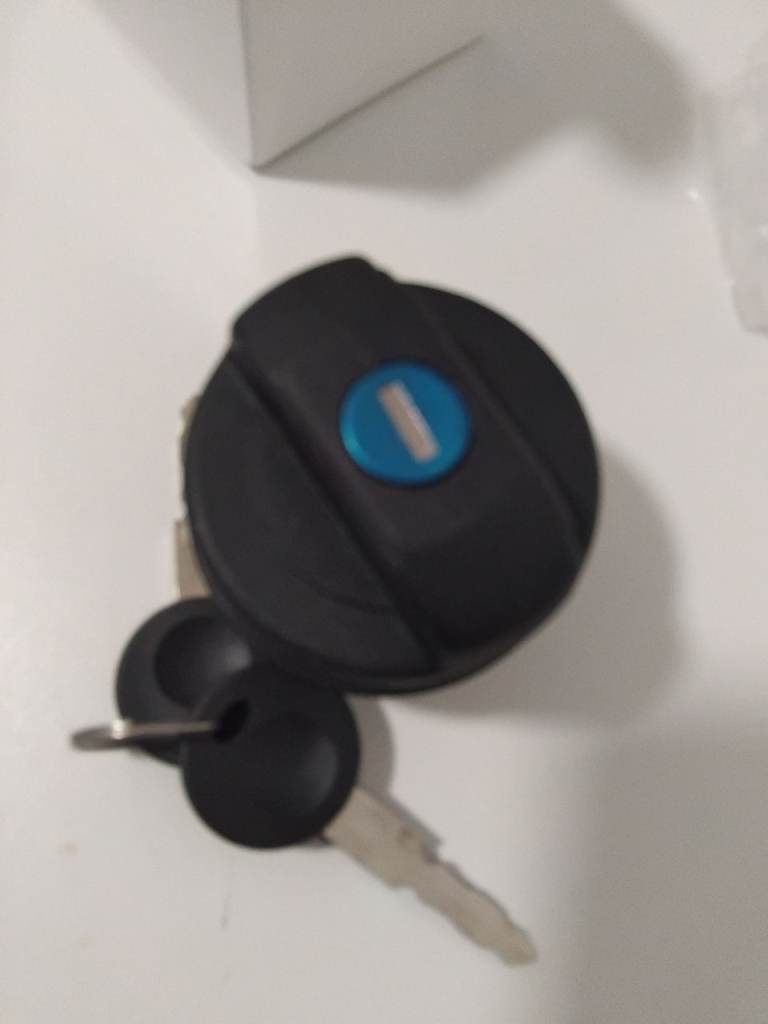 Fuel cap lock