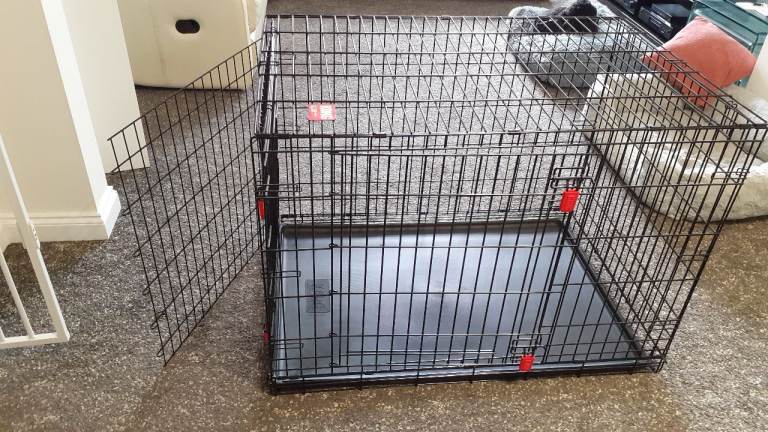 Dog crate. Kong Large Ultra Strong two door crate with divider.