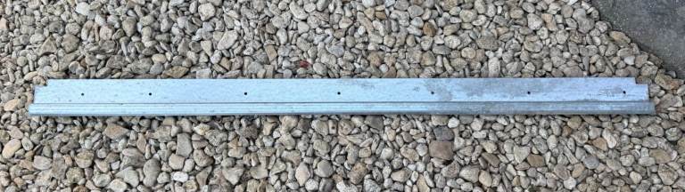 Land Rover Defender Rear Carpet Retainer Trim Strip - Galvanised Steel - unused