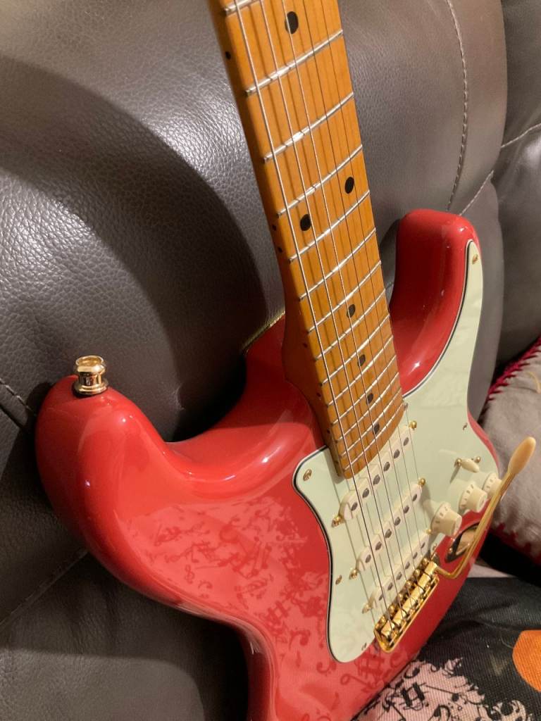 Fender Stratocaster with upgraded Fender gold hardware   
