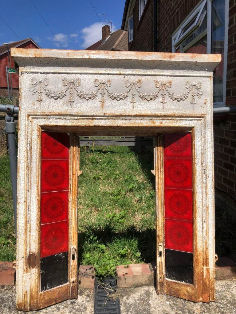 Vintage Cast Iron Fireplace Surround with Red Glass Panels