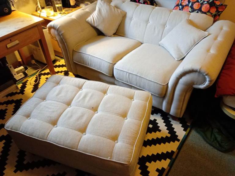 Two seater sofa and footstool . Free delivery 