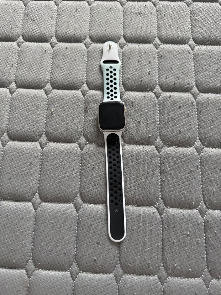 Apple Watch with White and Black Sports Band – Good Condition