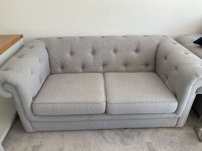 Two-Seater Grey Fabric Sofa – Good Condition