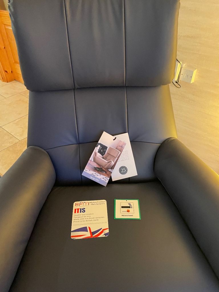 Parker knoll swivel leather chair