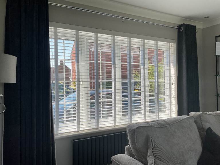 Wide slat  white window blind