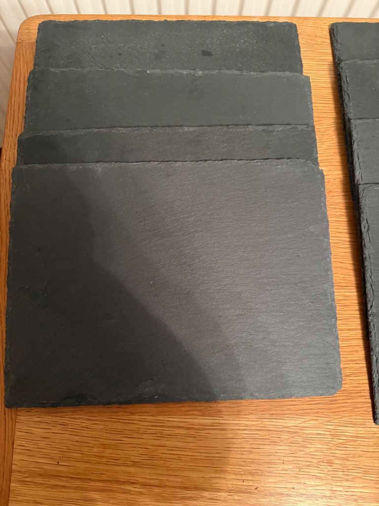 Set of 8 rustic slate placemats and coasters. 