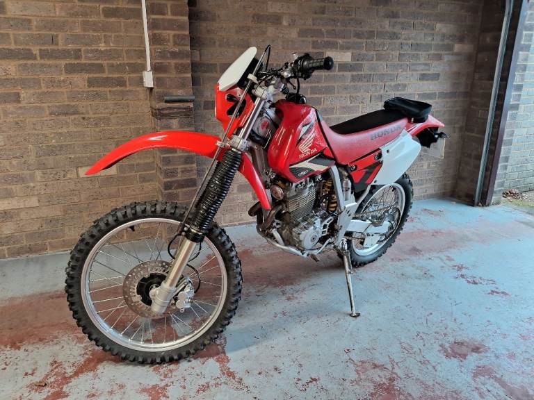 Honda XR250R 2002 only 6,823 miles from new - selling as a 'winter project'.