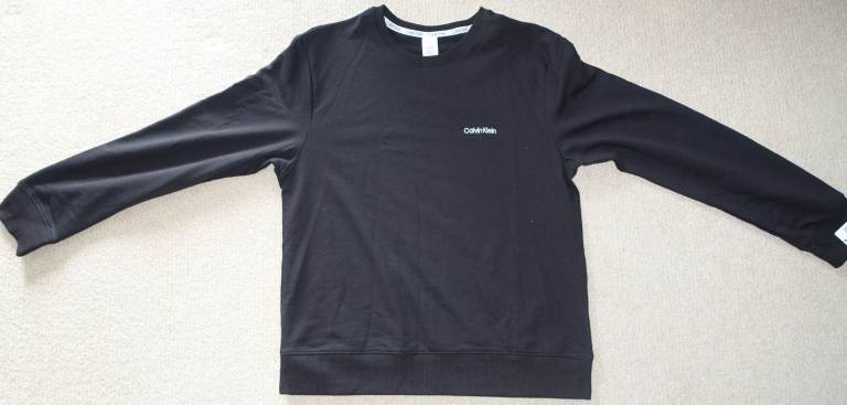 Stylish new Calvin Klein womens sleep top, black.  Label size small but please see photos 