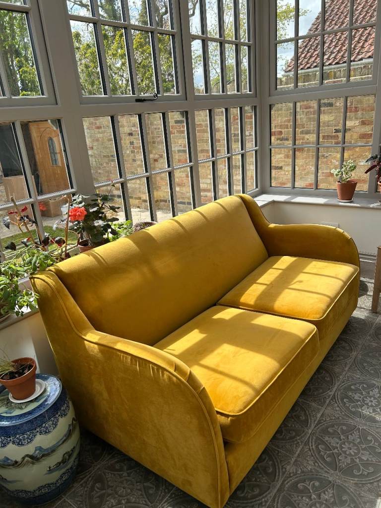 "Made" brand two seat sofa bed.  Velvet cloth.  Hardly used.  