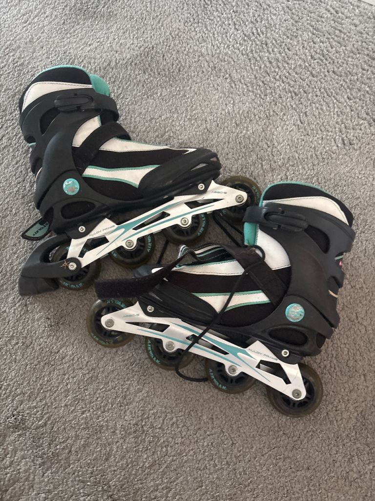 Black and White Inline Skates – Good Condition