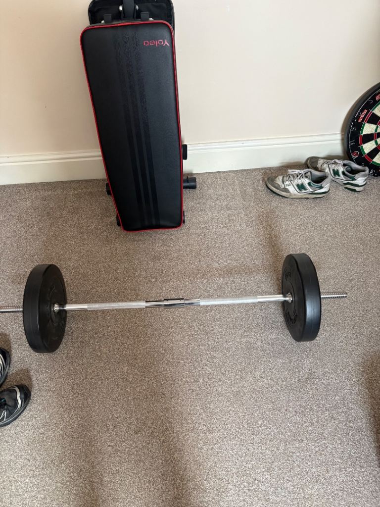 Barbell with Weight Plates – Good Condition