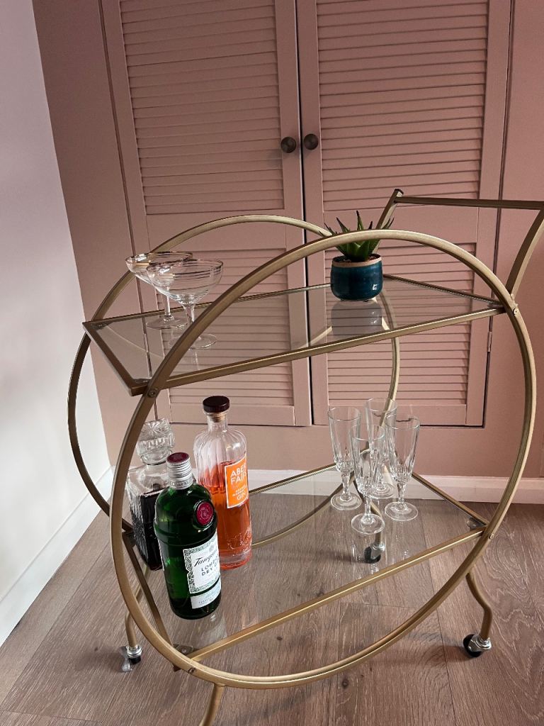 Art deco style gold drinks trolley as new
