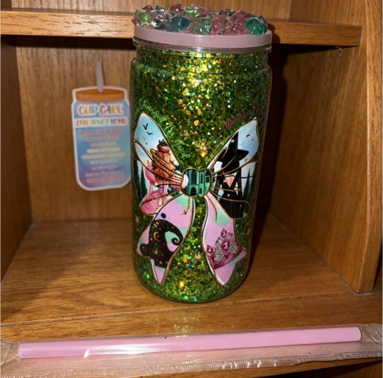 Sparkly Green Tumbler with Decorative Bow Design and Straw