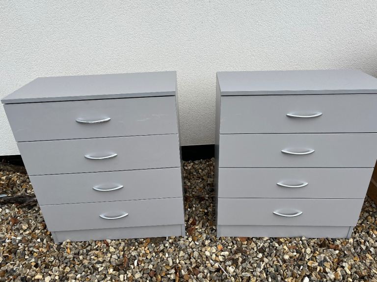 Two grey drawer units 