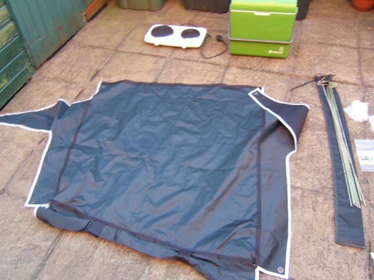 Camping Items: Caddy Rear Door Awning, WC Tent, Cool Box, Hob, Solar Charger, Storage Box