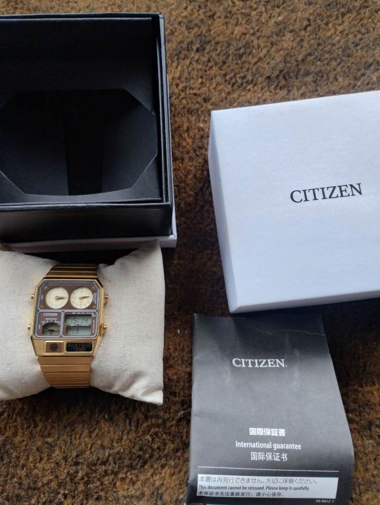 Citizen ana-digi-temp watch gold strap 