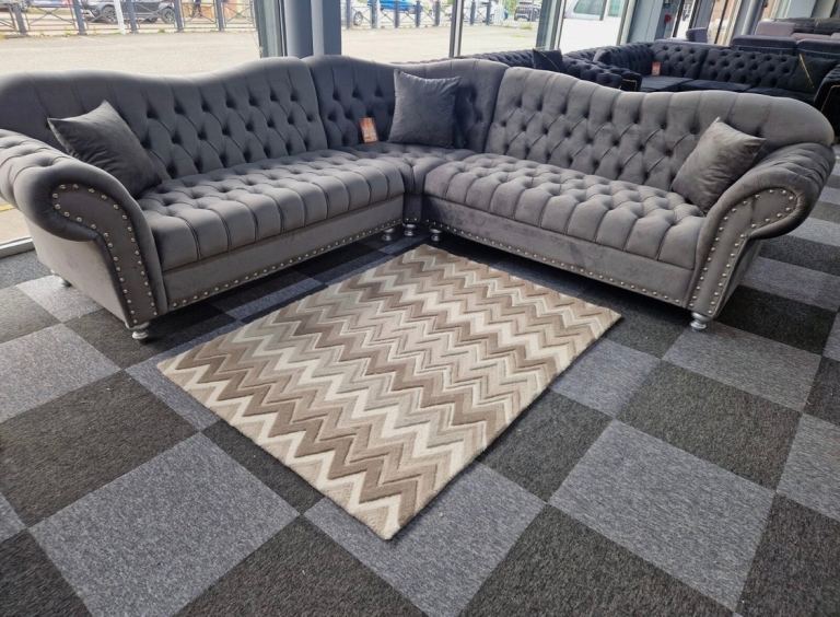 Grey Elegance curved corner chesterfield sofa