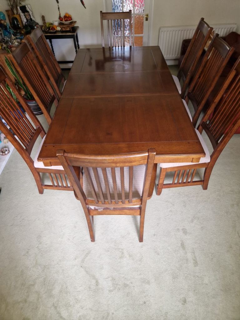 Solid Oak dining table with 8 chairs