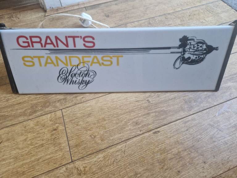 Grants whiskey hanging advertising sign