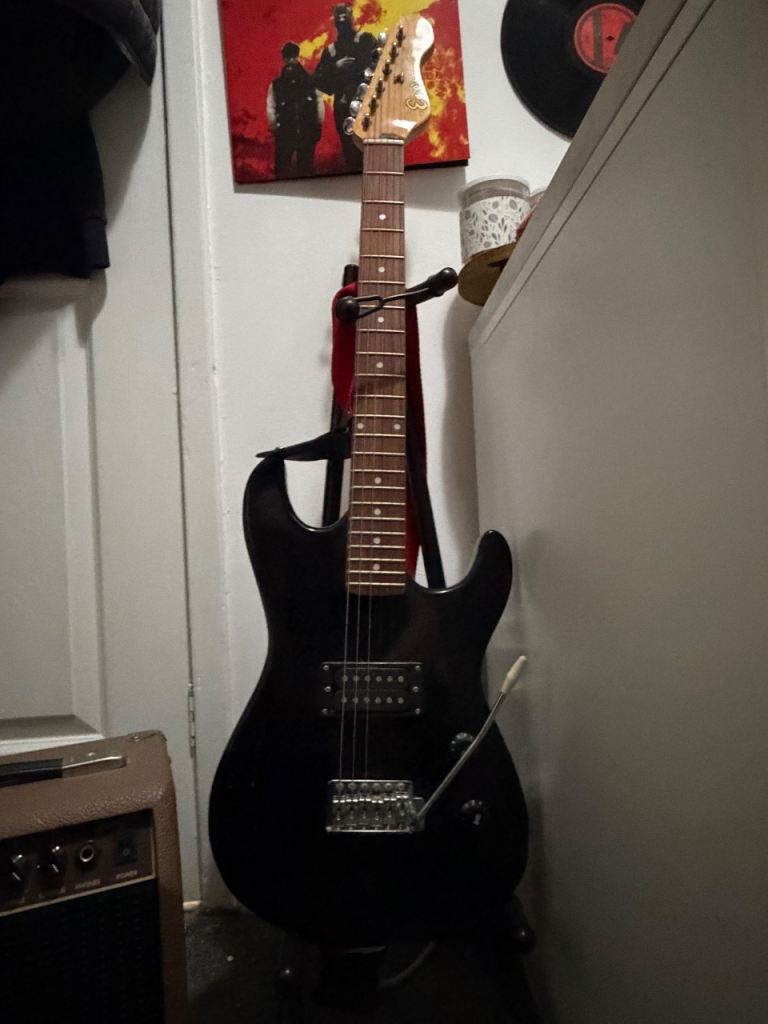 Electric guitar with an fender amp