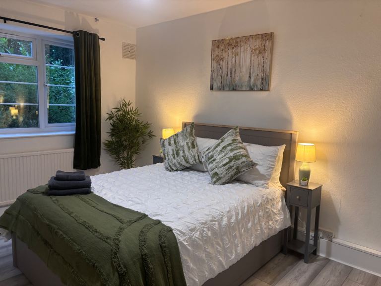 Grey Kingsize bed with storage