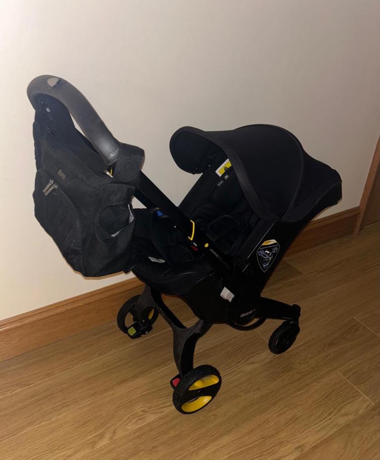 Doona Infant Car Seat & Stroller with ISOFIX Base – Black, Good Condition