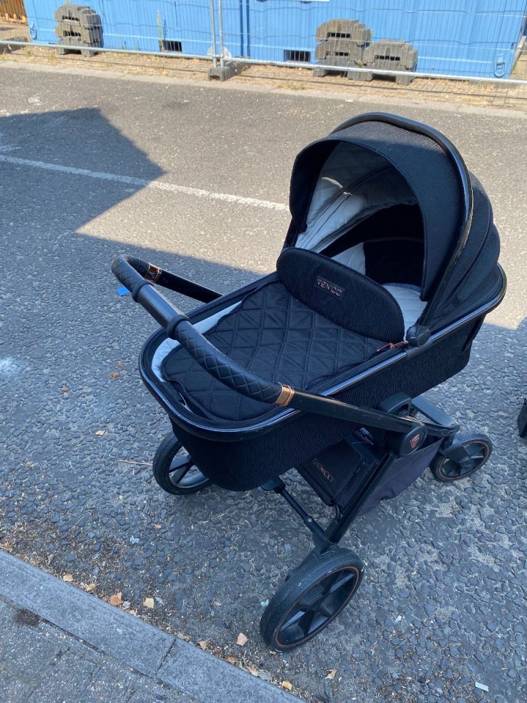 Venicci black and rose gold pram/buggy