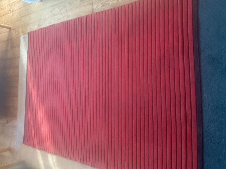 Free red cotton rug.