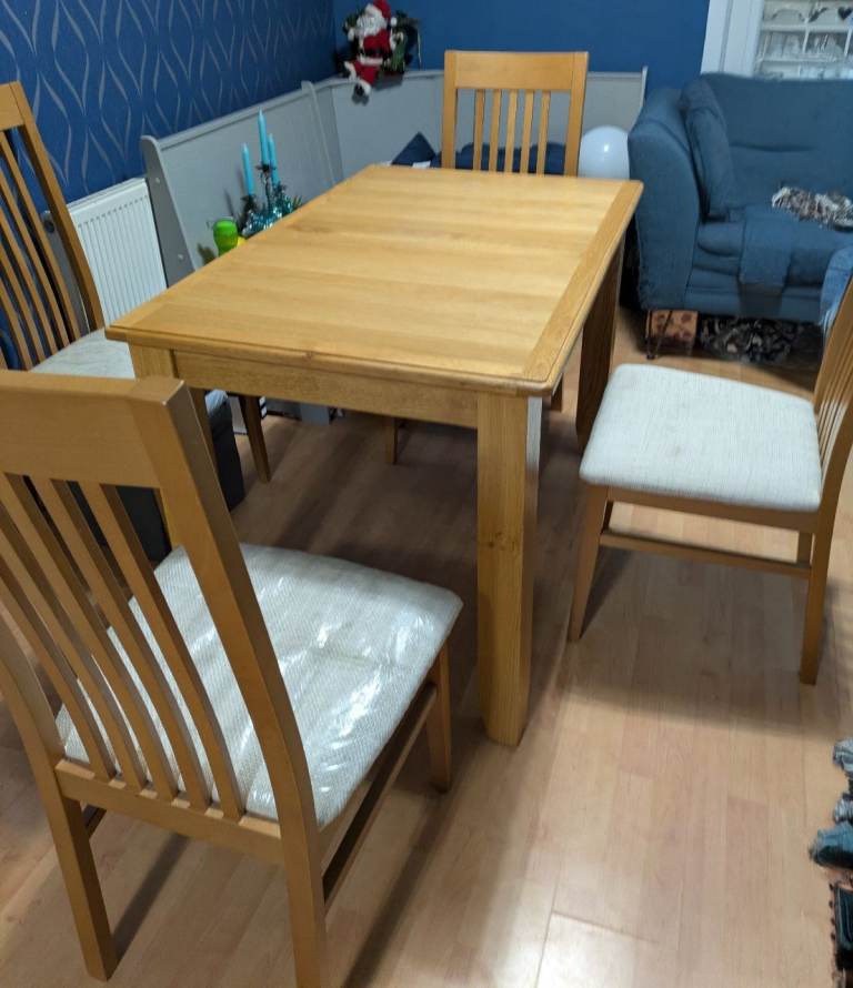 Solid wood large dinning table and chairs as new 