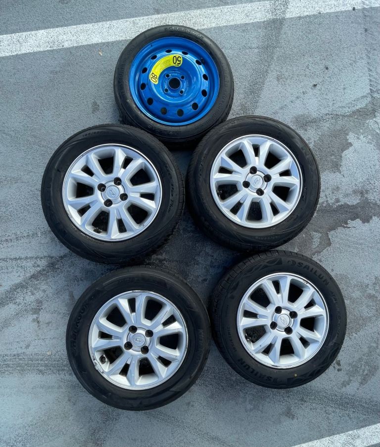 Set Of 4 Tyres and Genuine Alloy Wheels 