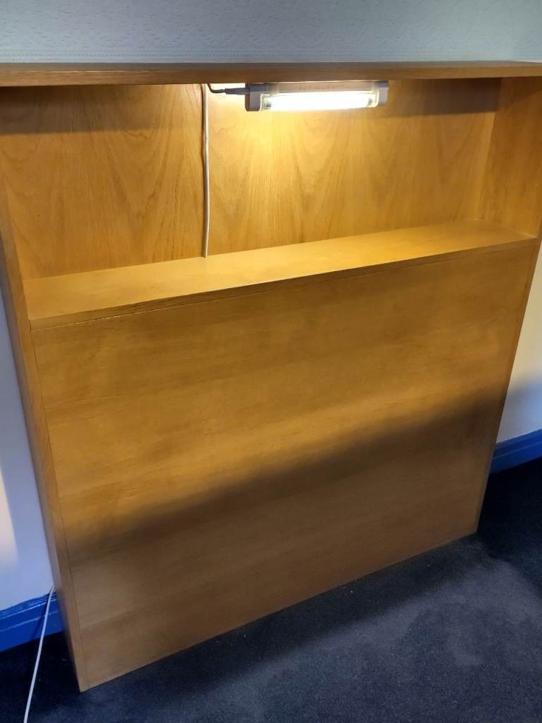 Bed headboard with light going free