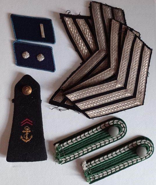 Mixed insignia 1940's German, 1950's French and British.