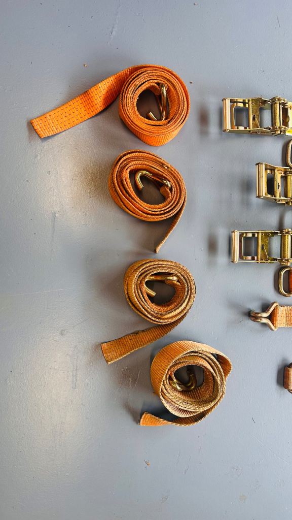 Car trailer ratchet straps. Wheel restraints